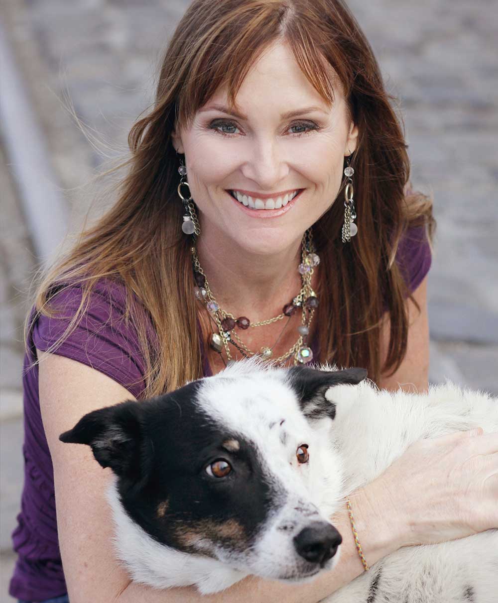 Kristin Morrison with black and white dog